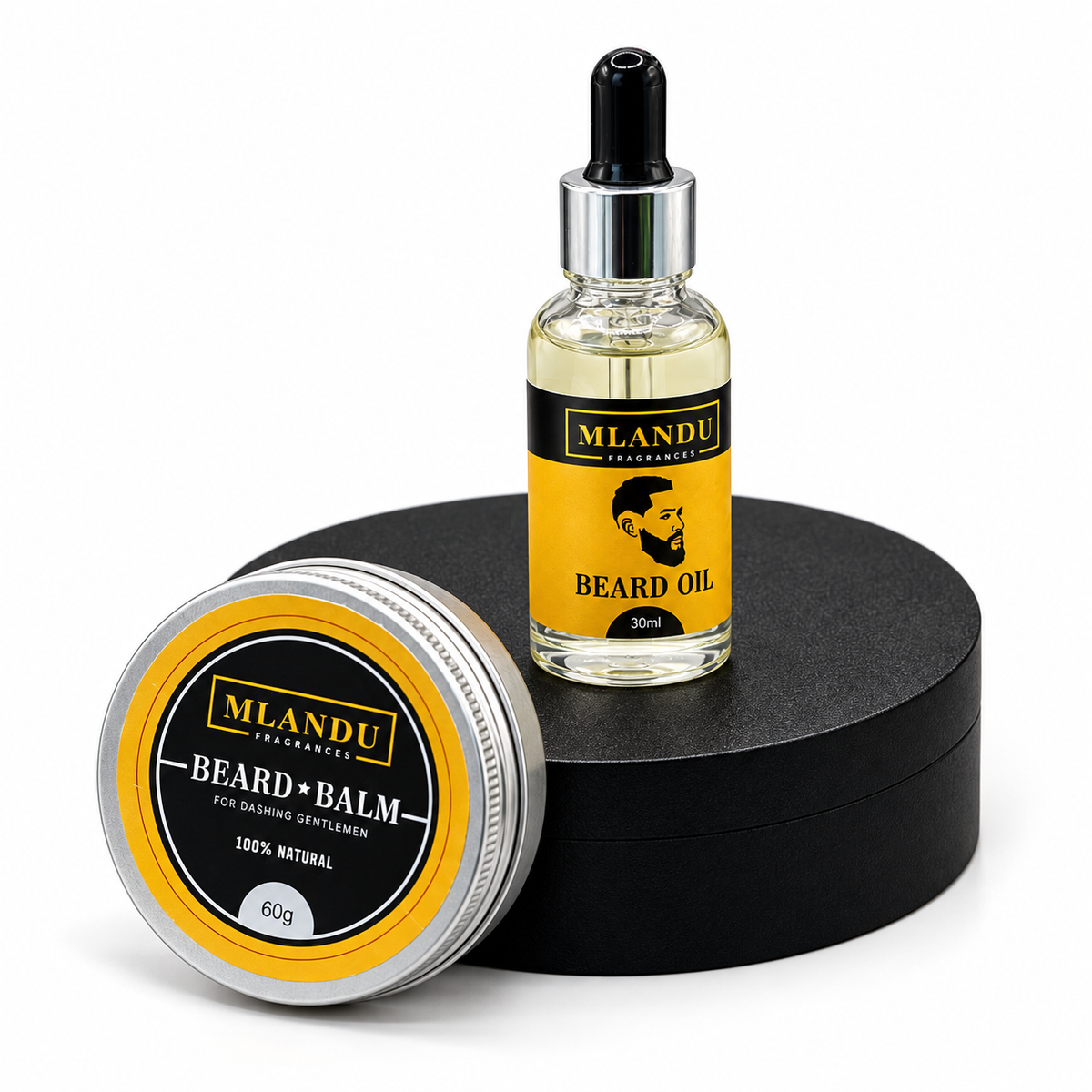 Mlandu Fragrances Beard Oil 30ml on black stand with Beard Balm 60g leaning against it
