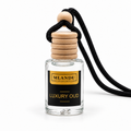 Luxury Oud car diffuser by Mlandu Fragrances on white background