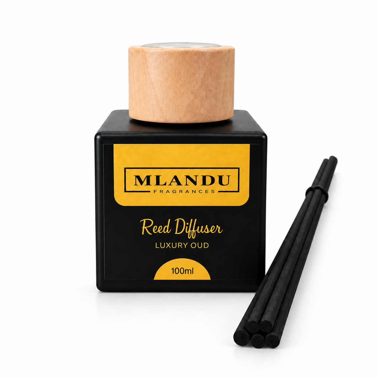 Luxury Oud 100ml reed diffuser with loose reeds on white background